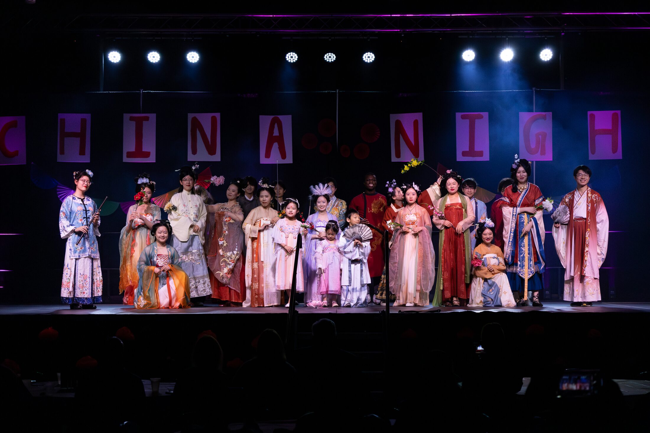 Community performers gathered on stage