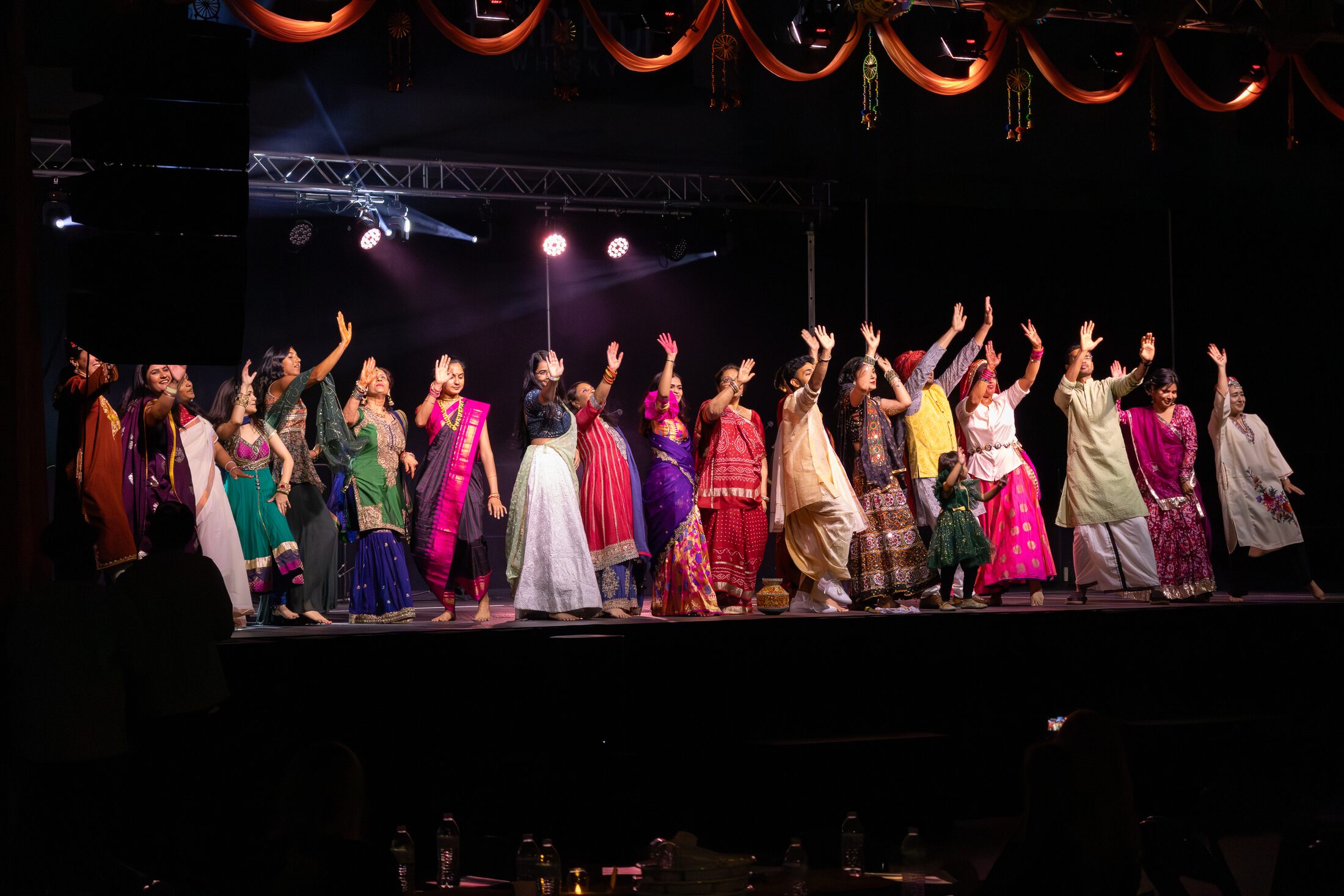 Colorful group performance at a cultural event