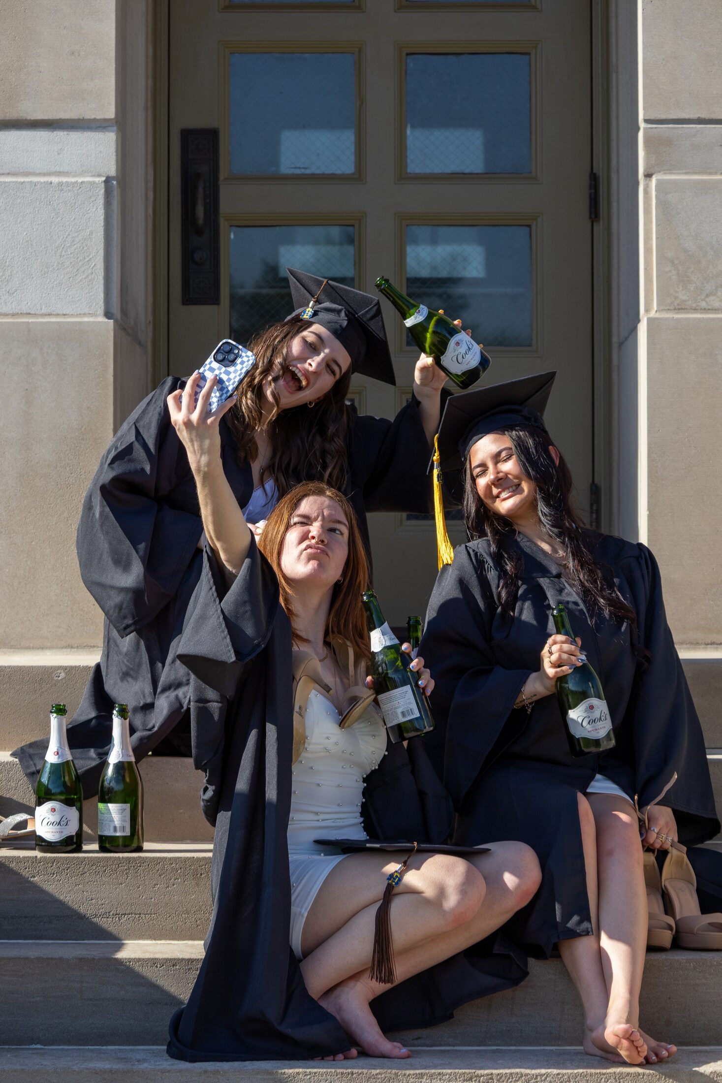 Graduates sharing a celebratory moment