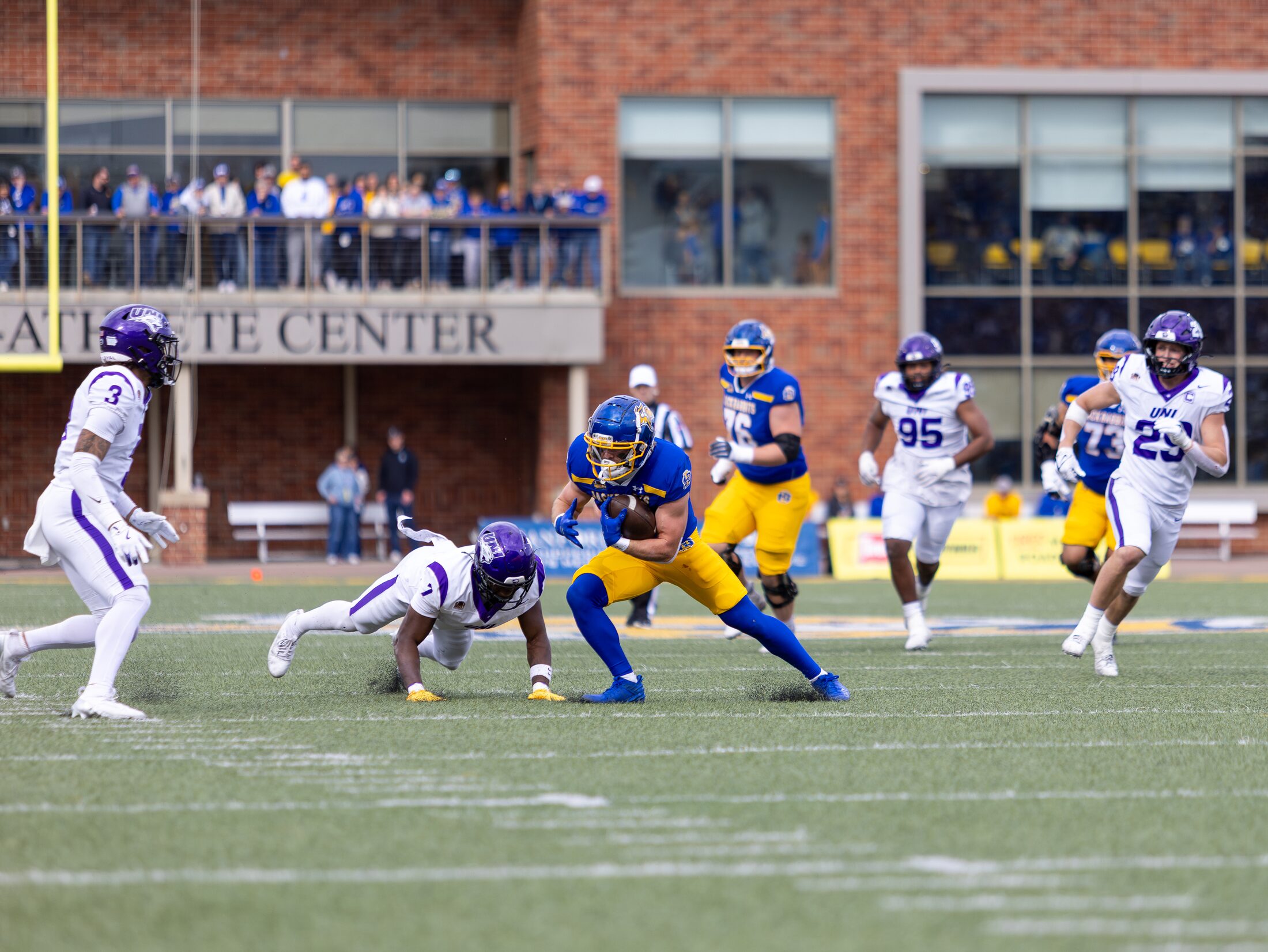 Football ball carrier in open field
