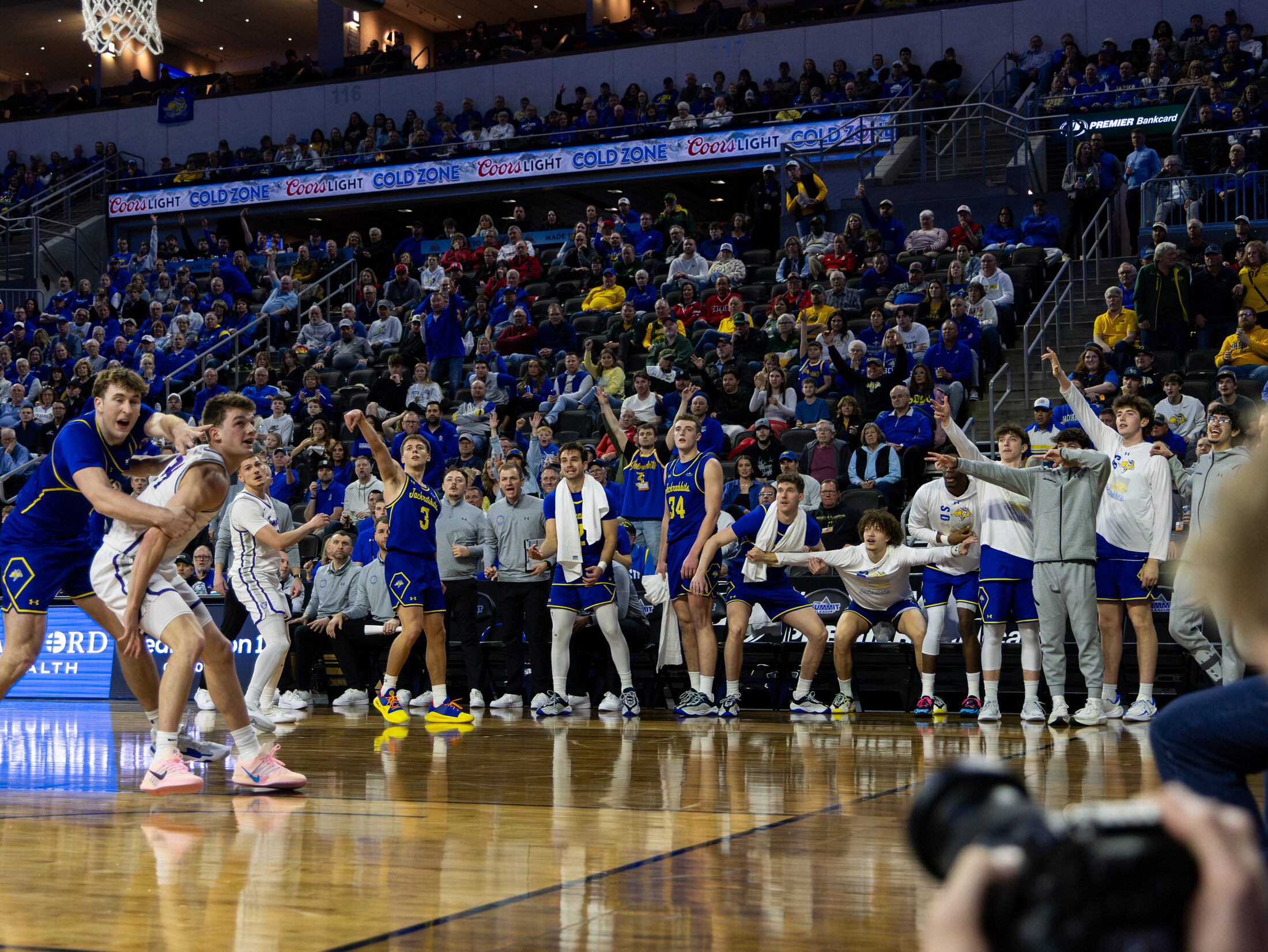 College basketball action at the basket