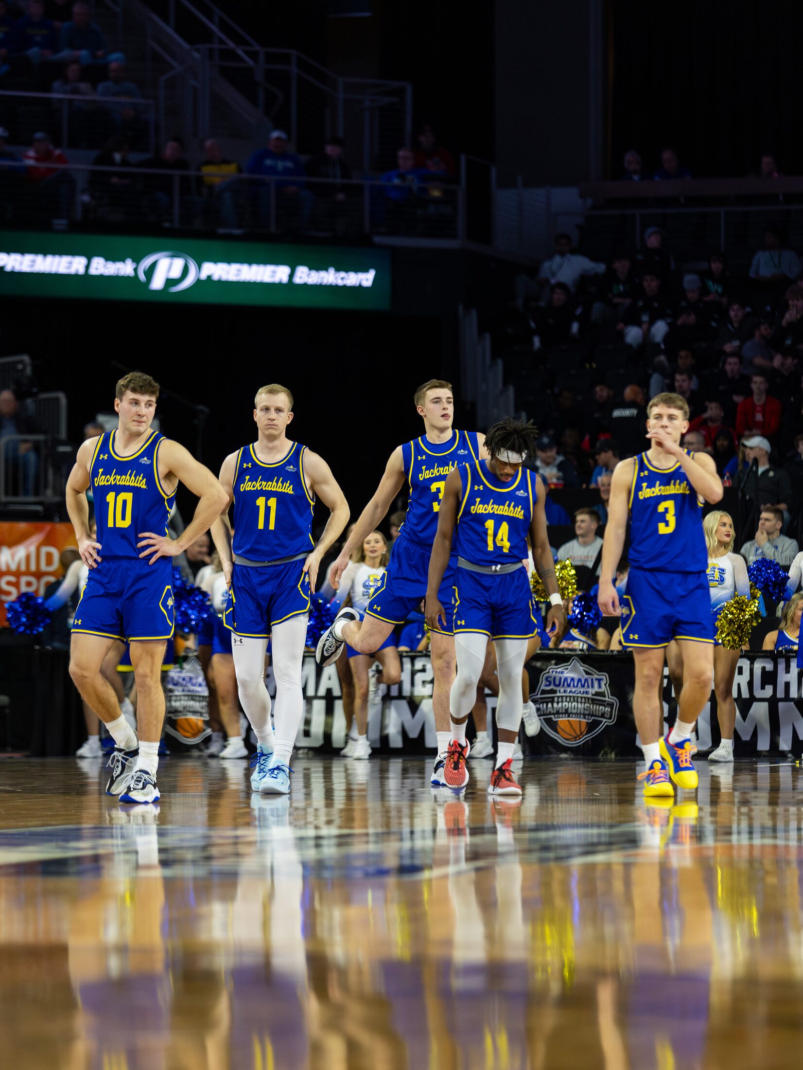 Basketball team walking onto the court